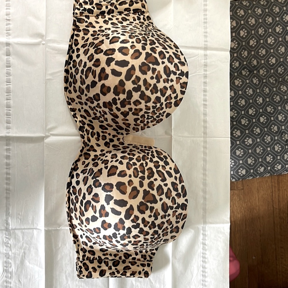 Leopard print strapless bra with underwire and adhesive to hold it up